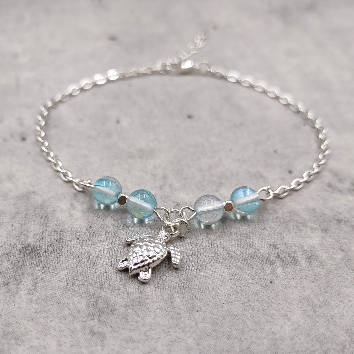 Sea Turtle Anklet Aqua Blue Beads Silver Color (approx. 9+ inches AROUND) Cute Blue Sea Turtle Charm Anklet for any beachy outfit!