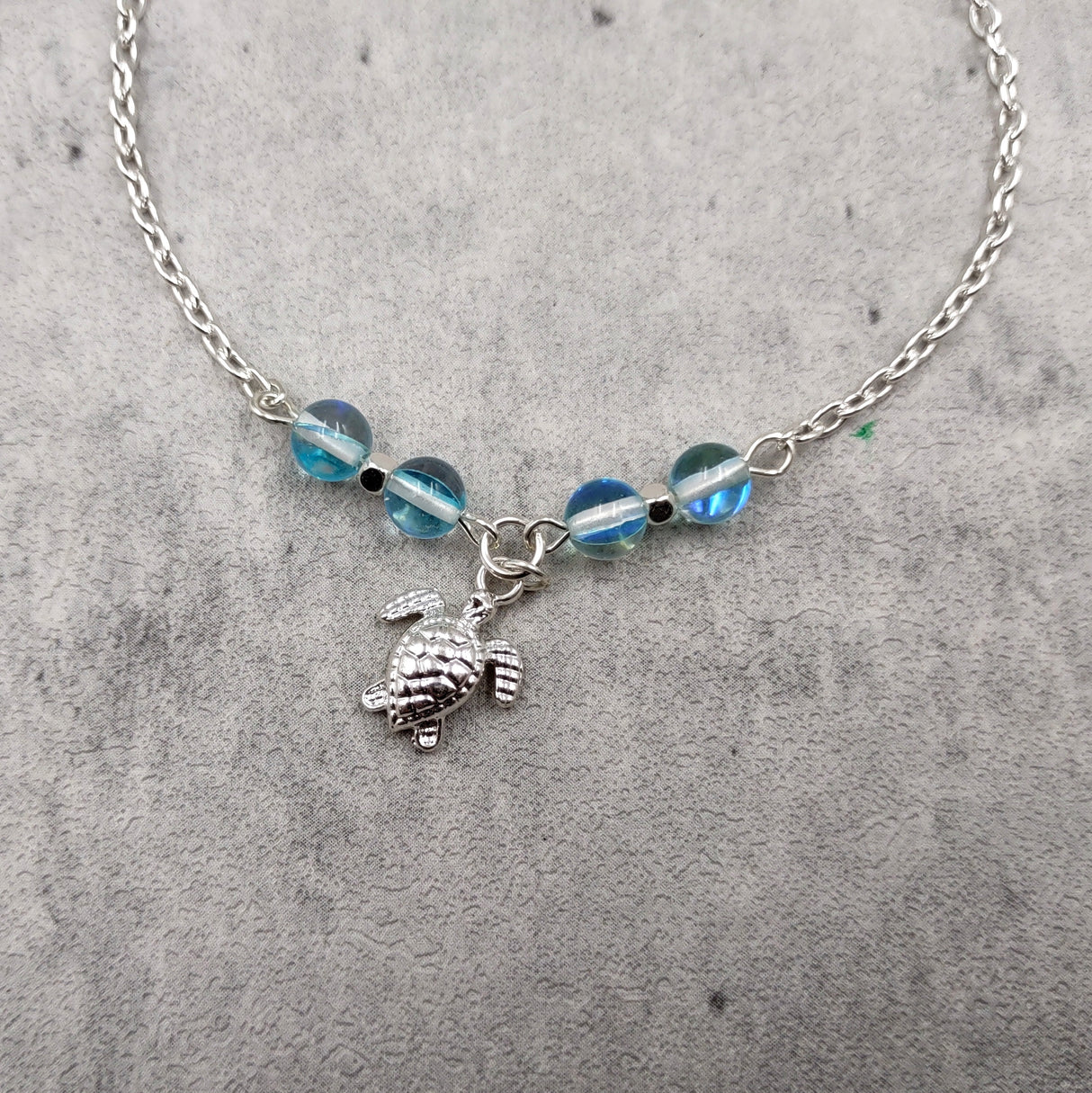 Sea Turtle Anklet Aqua Blue Beads Silver Color (approx. 9+ inches AROUND) Cute Blue Sea Turtle Charm Anklet for any beachy outfit!