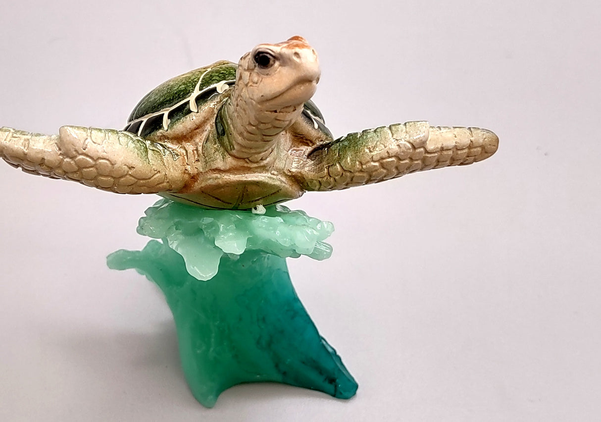 Green Sea Turtle Figurine Riding A Wave (One figure approx. 5+ inches long) Wonderful sea life décor for your home or office!
