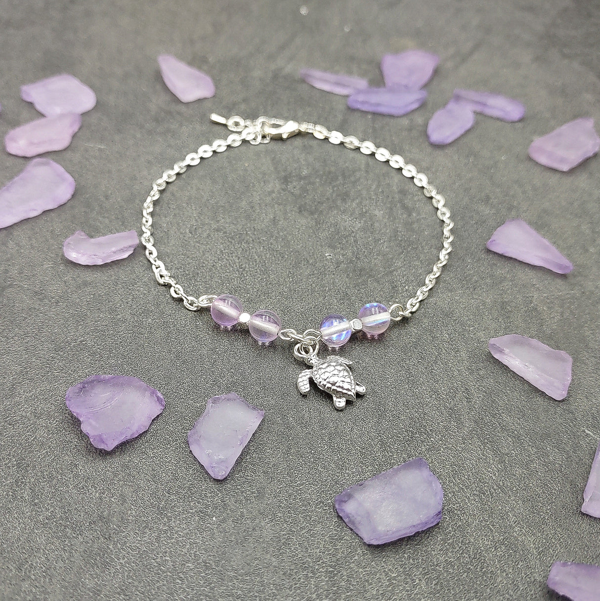 Sea Turtle Anklet Purple Beads Silver Color (approx. 9+ inches AROUND) Cute Light Purple Sea Turtle Charm Anklet for any beachy outfit!