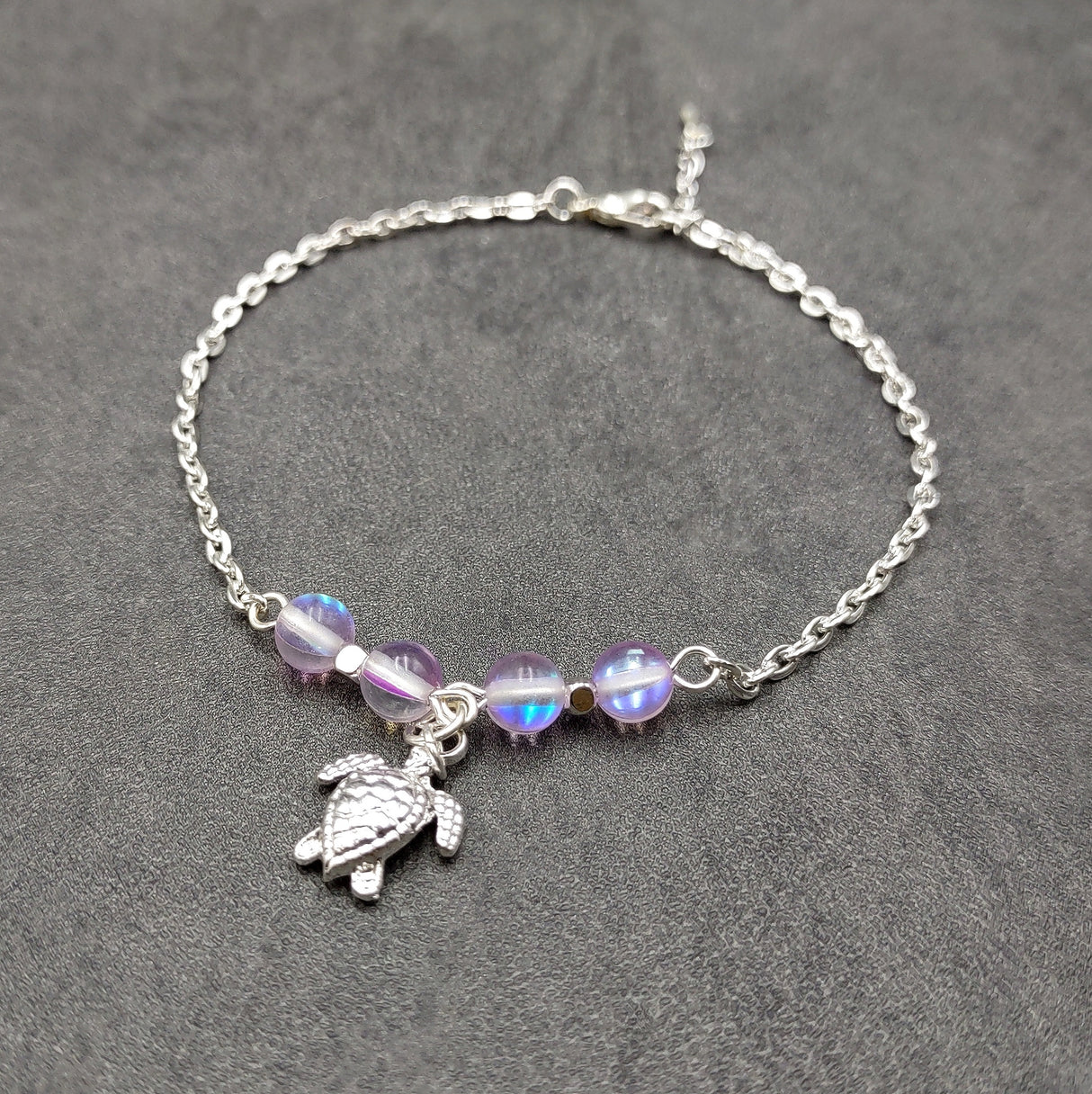 Sea Turtle Anklet Purple Beads Silver Color (approx. 9+ inches AROUND) Cute Light Purple Sea Turtle Charm Anklet for any beachy outfit!