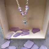 Sea Turtle Anklet Purple Beads Silver Color (approx. 9+ inches AROUND) Cute Light Purple Sea Turtle Charm Anklet for any beachy outfit!