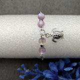 Sea Turtle Anklet Purple Beads Silver Color (approx. 9+ inches AROUND) Cute Light Purple Sea Turtle Charm Anklet for any beachy outfit!