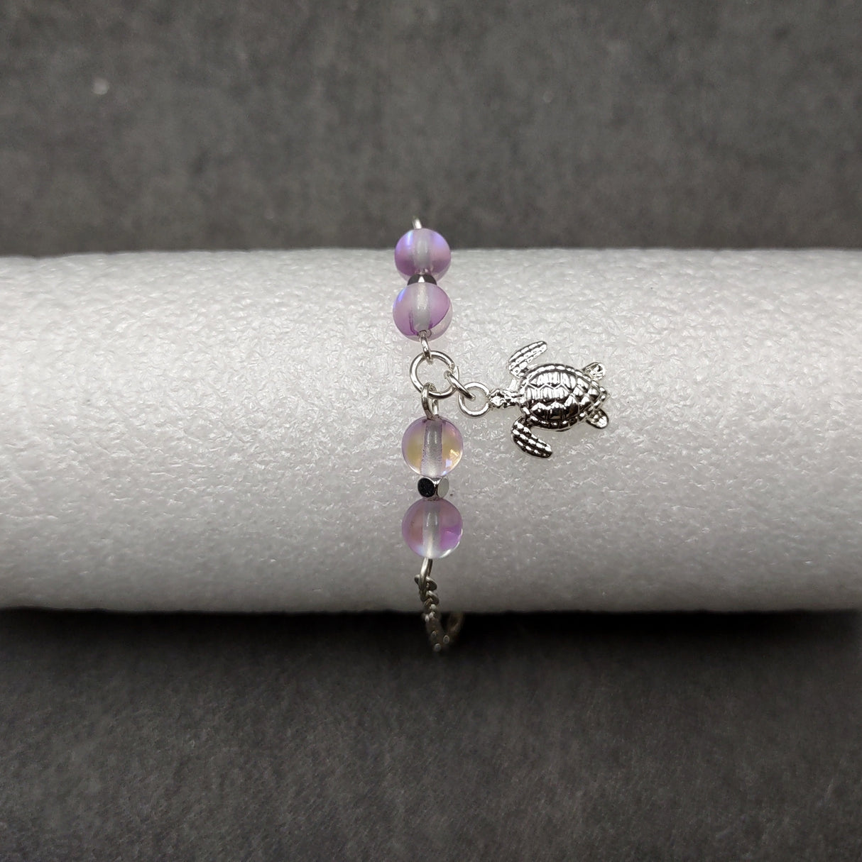 Sea Turtle Anklet Purple Beads Silver Color (approx. 9+ inches AROUND) Cute Light Purple Sea Turtle Charm Anklet for any beachy outfit!