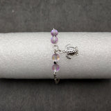 Sea Turtle Anklet Purple Beads Silver Color (approx. 9+ inches AROUND) Cute Light Purple Sea Turtle Charm Anklet for any beachy outfit!