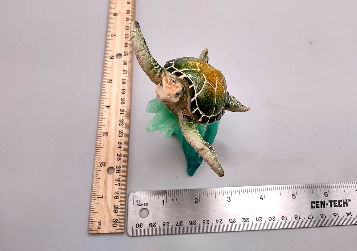 Green Sea Turtle Figurine Riding A Wave (One figure approx. 5+ inches long) Wonderful sea life décor for your home or office!