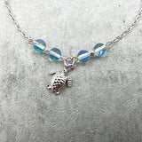 Sea Turtle Anklet Aqua Blue Beads Silver Color (approx. 9+ inches AROUND) Cute Blue Sea Turtle Charm Anklet for any beachy outfit!