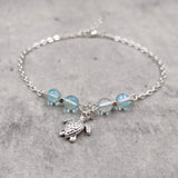 Sea Turtle Anklet Aqua Blue Beads Silver Color (approx. 9+ inches AROUND) Cute Blue Sea Turtle Charm Anklet for any beachy outfit!