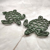 Cast Iron Sea Turtle Green Metal Trivet (1 trivet approx. 7+ inches wide) Green Metal Sea Turtle Trivet adds coastal charm & protection!