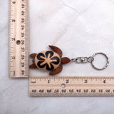 Natural Wood Plumeria Sea Turtle Keychain (1 key chain approx. 4+ inches) Wooden Pattern Sea Turtle Key Fob for gifting or decorative charm!